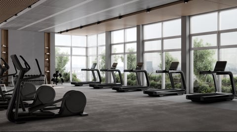 Gimnasio de hotel de lujo con equipos modernos