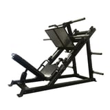 Black leg press machine with angled platform, footrest, and handlebar