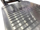 Metallic truck bed liner with ridged grooves