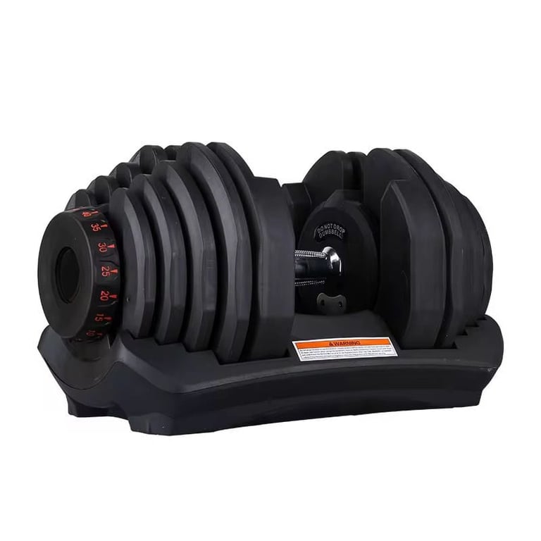 Black adjustable dumbbell on base with numbered weight plates and red adjustment dial