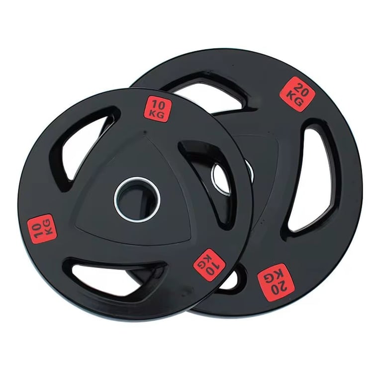 Two black weight plates with red kg markings and grip handles, overlapped in a stack arrangement
