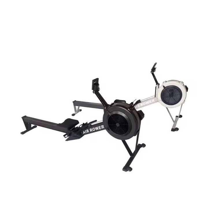 Air Rower rowing machine with black frame and foot pedals, displayed from overhead angle
