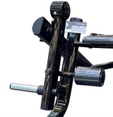 Black exercise leg press machine with pedals and mechanical components against white background