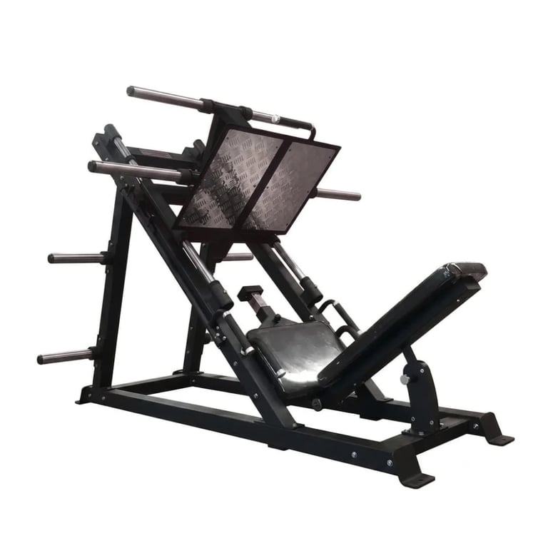 Black leg press machine with padded seat, backrest, and foot platform against white background