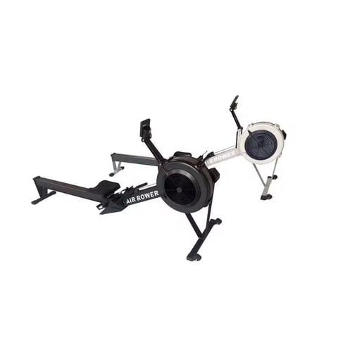 Air rower exercise machine with black frame, resistance wheel, and adjustable footrest shown from overhead view